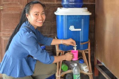 Woman with water filter