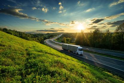 truck on street, green environment